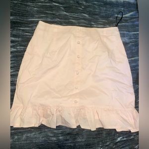 Pink women’s skirt with buttons